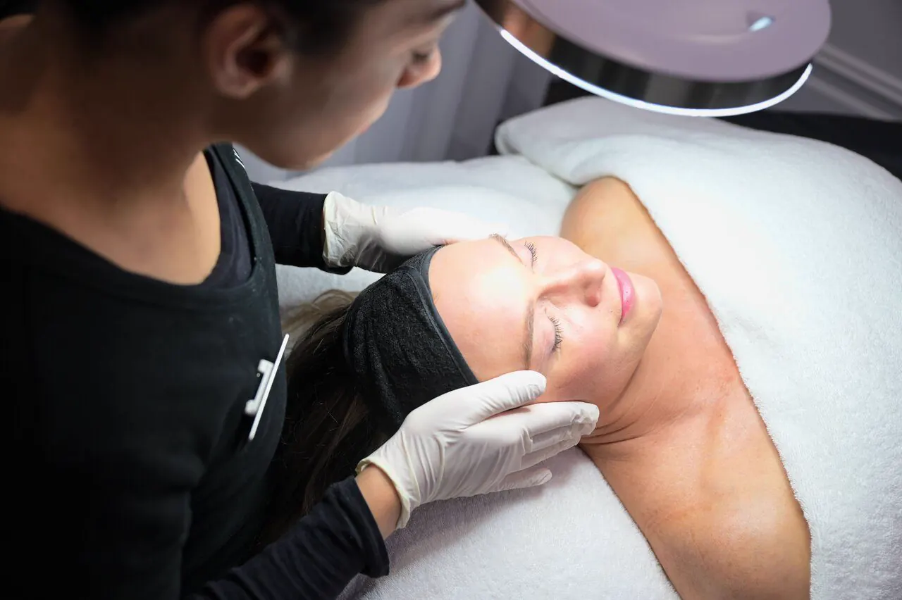 A mature client during a facial
